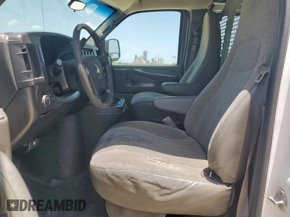 2014 Chevrolet Express Cargo z VIN 1GCZGTBG1E1115142, wystawiony jako Copart lot #61744635 z przebiegiem 192 407 mil mil oraz Czysty tytuł • Clean title. Historia ofert i sprzedaży dostępna na DreamBid. Obrazek 7.