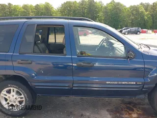2002 Jeep Grand Cherokee Laredo with VIN 1J8GW48SX2C270339, listed as a IAAI auction lot 42390842 with Not provided miles and . Bid and sale history available at DreamBid. Image 12.
