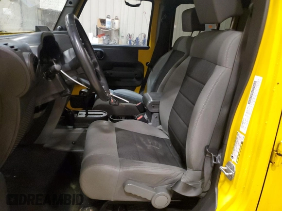 2008 Jeep Wrangler Unlimited X with VIN 1J4GA39148L609802, listed as a Copart auction lot 55179465 with 147,985 mi miles and Non repairable. Bid and sale history available at DreamBid. Image 7.