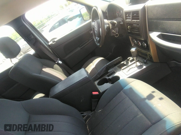 2012 Jeep Liberty Sport with VIN 1C4PJMAKXCW107531, listed as a IAAI auction lot 42155945 with 166,188 mi miles and . Bid and sale history available at carsss.com. Image 5.
