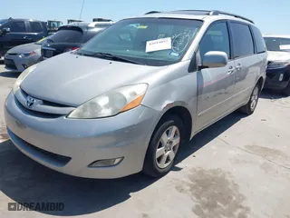 2010 Toyota Sienna XLE with VIN 5TDYK4CC9AS336044, listed as a IAAI auction lot 42013057 with 183,567 mi miles. Bid and sale history available at carsss.com. Image 18.