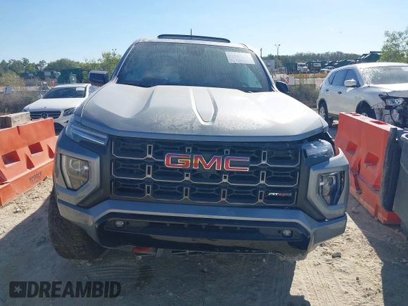 2024 GMC Canyon 4WD AT4X with VIN 1GTP6EEK6R1250127, listed as a IAAI auction lot 41823196 with 1,574 mi miles and . Bid and sale history available at carsss.com. Image 12.