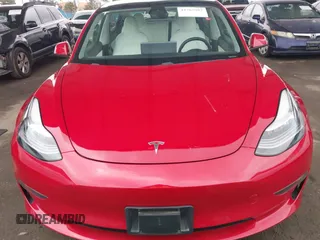2021 Tesla Model 3 Long Range with VIN 5YJ3E1EB3MF862392, listed as a IAAI auction lot 41765987 with 51,915 mi miles and . Bid and sale history available at DreamBid. Image 11.