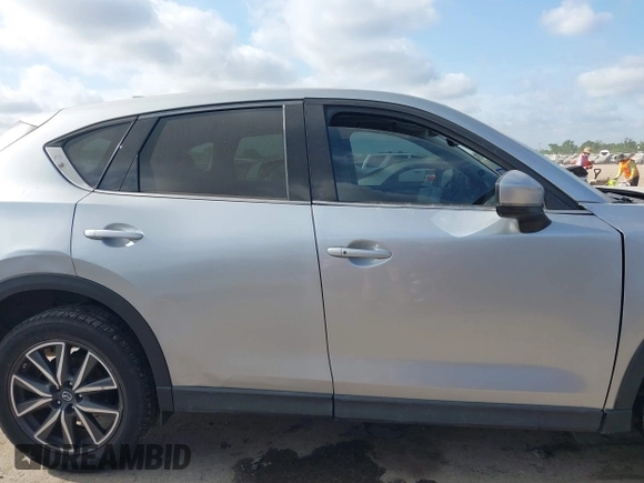2018 Mazda CX-5 Grand Touring with VIN JM3KFADM6J0325626, listed as a IAAI auction lot 42054702 with 121,952 mi miles and . Bid and sale history available at DreamBid. Image 12.