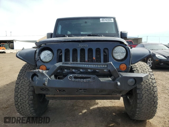 2008 Jeep Wrangler Unlimited Rubicon with VIN 1J4GA69108L501632, listed as a Copart auction lot 48742355 with 156,766 mi miles and Salvage Title. Bid and sale history available at carsss.com. Image 5.