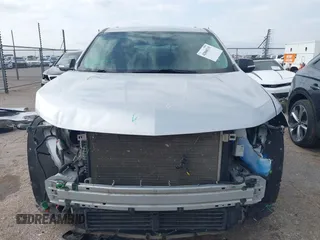 2018 Chevrolet Traverse LT Cloth z VIN 1GNEVGKW5JJ261287, wystawiony jako IAAI lot #42068315 z przebiegiem 152 956 mil mil oraz . Historia ofert i sprzedaży dostępna na DreamBid. Obrazek 13.