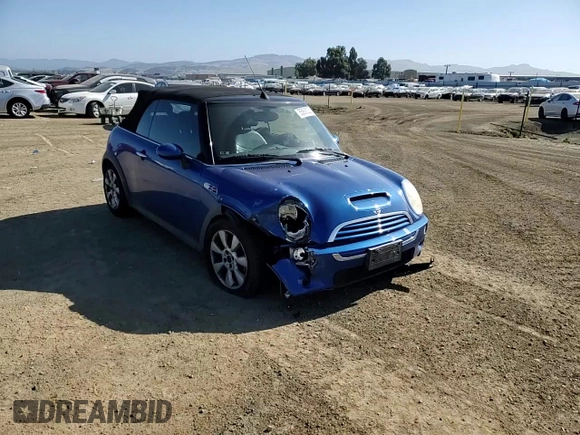 2005 MINI Convertible S z VIN WMWRH33565TK56154, wystawiony jako Copart lot #55860025 z przebiegiem 59 672 mil mil oraz Szkoda całkowita • Salvage title. Historia ofert i sprzedaży dostępna na DreamBid. Obrazek 13.