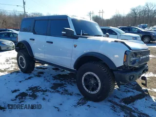 2023 Ford Bronco z VIN 1FMEE5DP1PLC08565, wystawiony jako IAAI lot #41610564 z przebiegiem 19 244 mil mil oraz . Historia ofert i sprzedaży dostępna na DreamBid. Obrazek 1.