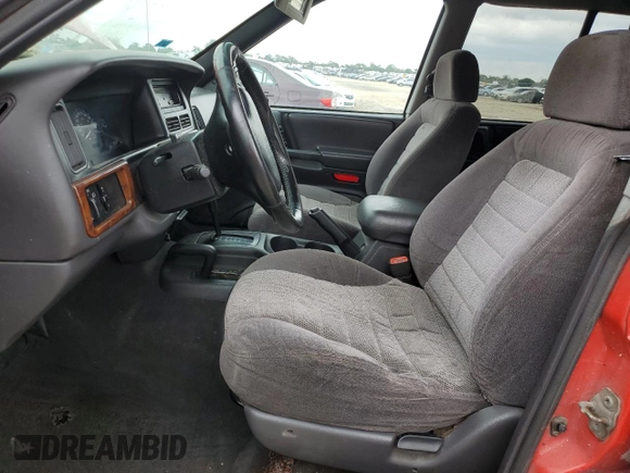 1997 Jeep Grand Cherokee Laredo with VIN 1J4GZ58S3VC770085, listed as a Copart auction lot 57584684 with 0 mi miles and Clean Title. Bid and sale history available at carsss.com. Image 7.