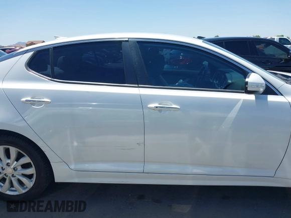 2015 Kia Optima EX z VIN 5XXGN4A72FG421289, wystawiony jako IAAI lot #42692024 z przebiegiem 91 000 mil mil oraz . Historia ofert i sprzedaży dostępna na DreamBid. Obrazek 13.