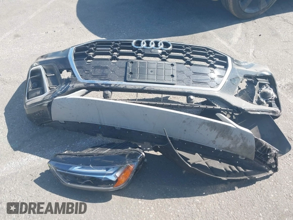2021 Audi Q5 Premium Plus z VIN WA1E2AFY6M2060131, wystawiony jako IAAI lot #42484535 z przebiegiem 27 220 mil mil oraz . Historia ofert i sprzedaży dostępna na DreamBid. Obrazek 12.