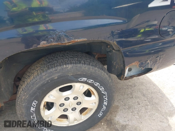2004 Chevrolet Avalanche with VIN 3GNEC12T74G142266, listed as a IAAI auction lot 42783128 with 205,225 mi miles and . Bid and sale history available at DreamBid. Image 6.