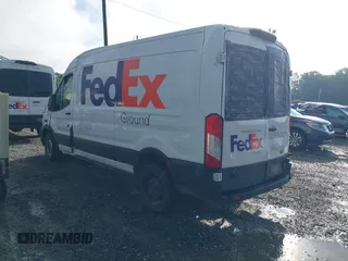 2020 Ford Transit Cargo z VIN 1FTBR1C87LKA51039, wystawiony jako IAAI lot #42212523 z przebiegiem 183 020 mil mil oraz . Historia ofert i sprzedaży dostępna na DreamBid. Obrazek 3.
