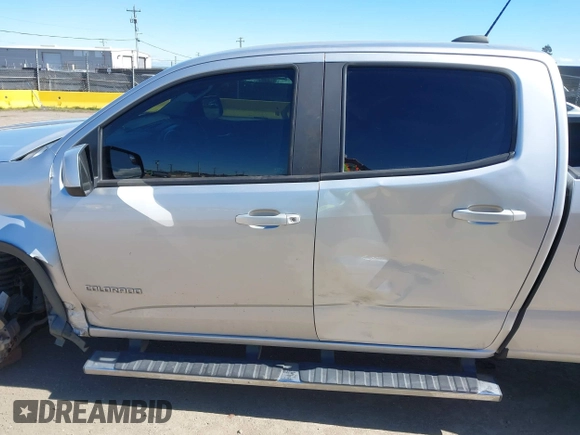 2019 Chevrolet Colorado 4WD Z71 z VIN 1GCGTDEN2K1146043, wystawiony jako IAAI lot #41712002 z przebiegiem 84 034 mil mil oraz . Historia ofert i sprzedaży dostępna na DreamBid. Obrazek 15.