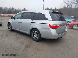 2011 Honda Odyssey EX-L with VIN 5FNRL5H65BB047291, listed as a IAAI auction lot 42094374 with 200,372 mi miles. Bid and sale history available at carsss.com. Image 3.