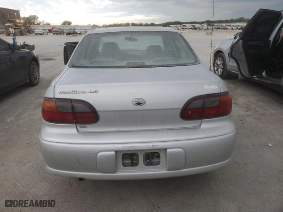 2001 Chevrolet Malibu LS with VIN 1G1NE52J916227544, listed as a Copart auction lot 71095404 with 136,767 mi miles and Salvage Title. Bid and sale history available at carsss.com. Image 6.