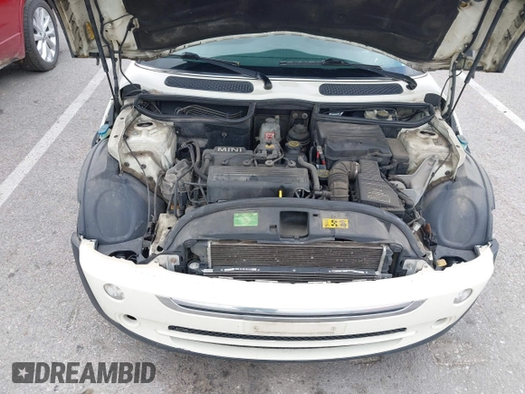2006 MINI Hardtop with VIN WMWRC33566TK73763, listed as a IAAI auction lot 42782654 with 103,751 mi miles and . Bid and sale history available at DreamBid. Image 10.
