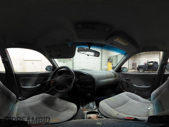 2003 Kia Spectra GS z VIN KNAFB161035115874, wystawiony jako IAAI lot #42179809 z przebiegiem 127 594 mil mil oraz . Historia ofert i sprzedaży dostępna na DreamBid. Obrazek 18.