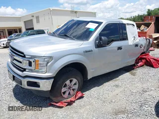 2018 Ford F-150 XL with VIN 1FTEW1EG6JFD14007, listed as a IAAI auction lot 36180966 with 124,521 mi miles and . Bid and sale history available at DreamBid. Image 2.