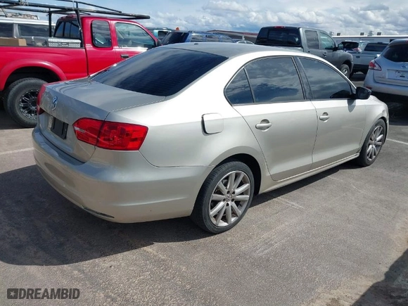2013 Volkswagen Jetta Sedan S with VIN 3VW2K7AJ8DM242716, listed as a IAAI auction lot 41797464 with 143,030 mi miles. Bid and sale history available at carsss.com. Image 4.