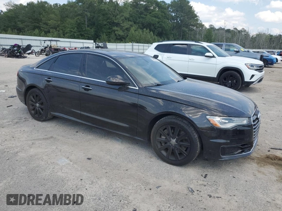 2016 Audi A6 Premium Plus with VIN WAUGFAFC0GN009716, listed as a Copart auction lot 56692645 with 82,189 mi miles and Salvage title. Bid and sale history available at DreamBid. Image 4.