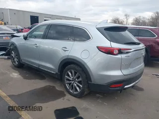2021 Mazda CX-9 Grand Touring with VIN JM3TCBDY8M0515065, listed as a IAAI auction lot 41359765 with 80,221 mi miles and . Bid and sale history available at carsss.com. Image 3.