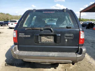 2000 Isuzu Rodeo S with VIN 4S2CK58W7Y4309261, listed as a Copart auction lot 54000775 with 187,949 mi miles and Salvage title. Bid and sale history available at DreamBid. Image 6.