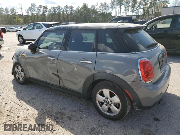 2016 MINI Hardtop 4 Door with VIN WMWXU1C55G2D09641, listed as a Copart auction lot 50567495 with 123,796 mi miles and Salvage Title. Bid and sale history available at DreamBid. Image 2.