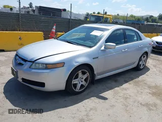 2005 Acura TL with VIN 19UUA66205A008810, listed as a IAAI auction lot 42079113 with 115,164 mi miles. Bid and sale history available at carsss.com. Image 2.