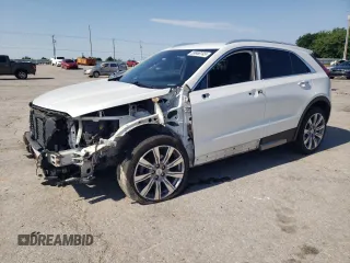 2020 Cadillac XT4 FWD Premium Luxury with VIN 1GYFZCR4XLF101193, listed as a Copart auction lot 59968145 with 135,218 mi miles and Salvage title. Bid and sale history available at DreamBid. Image 1.