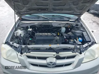 2006 Mazda Tribute S with VIN 4F2YZ04136KM15337, listed as a IAAI auction lot 41689177 with 153,720 mi miles and . Bid and sale history available at DreamBid. Image 10.