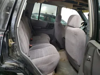 1996 Jeep Grand Cherokee Laredo with VIN 1J4GZ58S0TC402024, listed as a Copart auction lot 65074774 with 163,477 mi miles and Salvage Title. Bid and sale history available at carsss.com. Image 11.