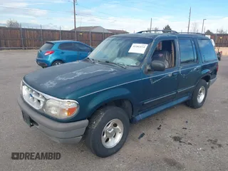 1996 Ford Explorer XL z VIN 1FMDU34X1TUCO1607, wystawiony jako IAAI lot #41182134 z przebiegiem 200 982 mil mil oraz . Historia ofert i sprzedaży dostępna na DreamBid. Obrazek 2.