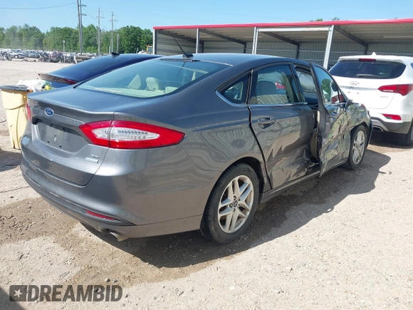 2014 Ford Fusion SE with VIN 3FA6P0HD8ER217256, listed as a IAAI auction lot 41991177 with 77,612 mi miles and . Bid and sale history available at DreamBid. Image 4.