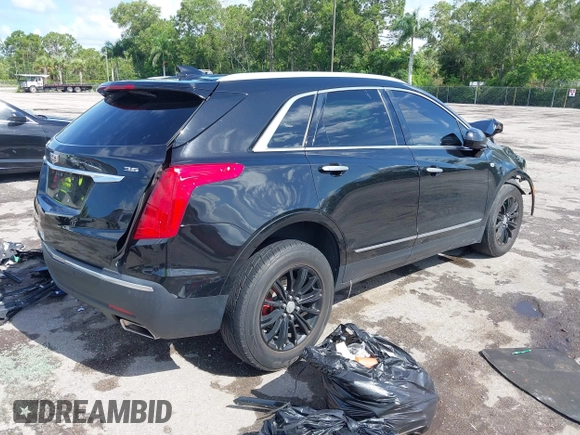 2018 Cadillac XT5 FWD with VIN 1GYKNARS2JZ160862, listed as a IAAI auction lot 42584234 with 152,785 mi miles and . Bid and sale history available at DreamBid. Image 4.