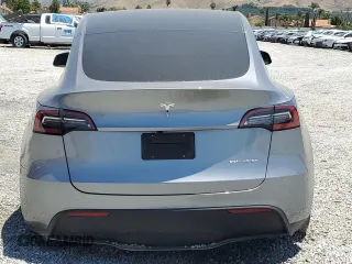 2024 Tesla Model Y Long Range with VIN 7SAYGDEE0RA288420, listed as a Copart auction lot 59159015 with 7,831 mi miles and Salvage title. Bid and sale history available at DreamBid. Image 6.