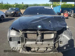 2011 BMW 3 Series 328i with VIN WBAKE5C56BE754926, listed as a Copart auction lot 55842425 with 169,806 mi miles and Salvage title. Bid and sale history available at DreamBid. Image 5.