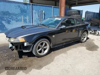 2004 Ford Mustang Standard with VIN 1FAFP40484F121187, listed as a Copart auction lot 52728965 with 175,692 mi miles and Salvage Title. Bid and sale history available at carsss.com. Image 1.