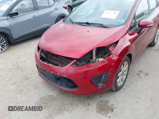 2013 Ford Fiesta SE with VIN 3FADP4EJXDM152463, listed as a IAAI auction lot 42122969 with 66,952 mi miles and . Bid and sale history available at DreamBid. Image 6.