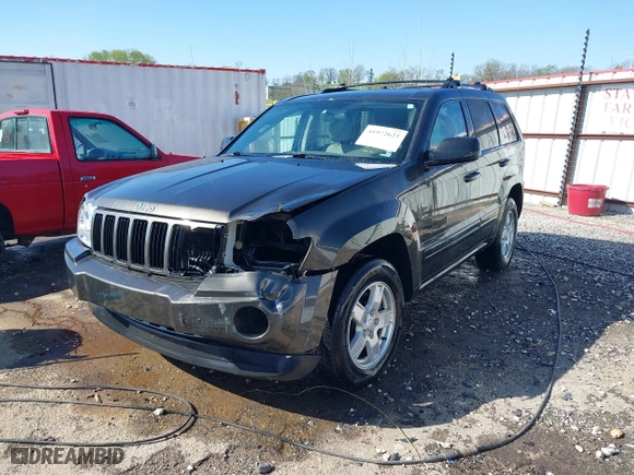 2006 Jeep Grand Cherokee Laredo with VIN 1J4GR48K56C326847, listed as a IAAI auction lot 41972623 with 141,088 mi miles. Bid and sale history available at carsss.com. Image 18.