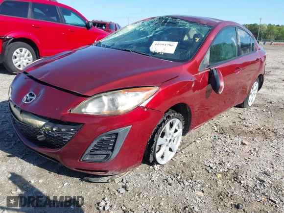 2011 Mazda 3 i Touring with VIN JM1BL1VF2B1443055, listed as a IAAI auction lot 41994706 with 180,293 mi miles and . Bid and sale history available at DreamBid. Image 2.