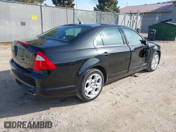 2011 Ford Fusion SE with VIN 3FAHP0HA3BR278427, listed as a IAAI auction lot 41771864 with 115,114 mi miles. Bid and sale history available at carsss.com. Image 4.
