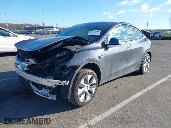 2020 Tesla Model Y Long Range with VIN 5YJYGDEE4LF030103, listed as a IAAI auction lot 41328929 with 64,896 mi miles and . Bid and sale history available at DreamBid. Image 17.