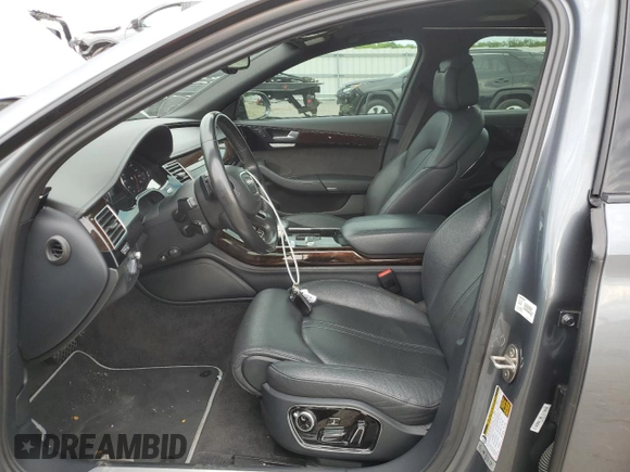 2017 Audi A8 z VIN WAU44AFD1HN009176, wystawiony jako Copart lot #57647675 z przebiegiem 94 317 mil mil oraz Szkoda całkowita • Salvage title. Historia ofert i sprzedaży dostępna na DreamBid. Obrazek 7.