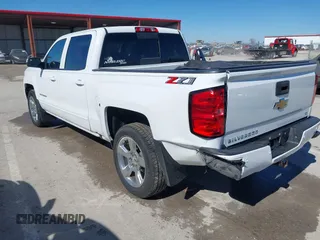2018 Chevrolet Silverado 1500 LT with VIN 3GCUKREC3JG634354, listed as a IAAI auction lot 41734436 with 135,846 mi miles. Bid and sale history available at carsss.com. Image 3.