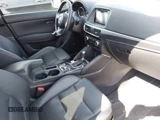 2016 Mazda CX-5 Grand Touring with VIN JM3KE4DY8G0639570, listed as a IAAI auction lot 42098512 with 126,541 mi miles and . Bid and sale history available at carsss.com. Image 5.