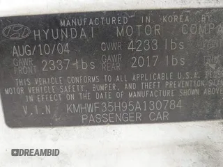 2005 Hyundai Sonata GLS with VIN KMHWF35H95A130784, listed as a IAAI auction lot 41936386 with 220,227 mi miles. Bid and sale history available at carsss.com. Image 9.
