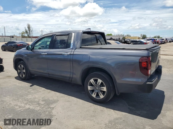 2017 Honda Ridgeline RTL-E with VIN 5FPYK3F74HB027130, listed as a Copart auction lot 60146905 with 99,964 mi miles and Salvage title. Bid and sale history available at DreamBid. Image 2.