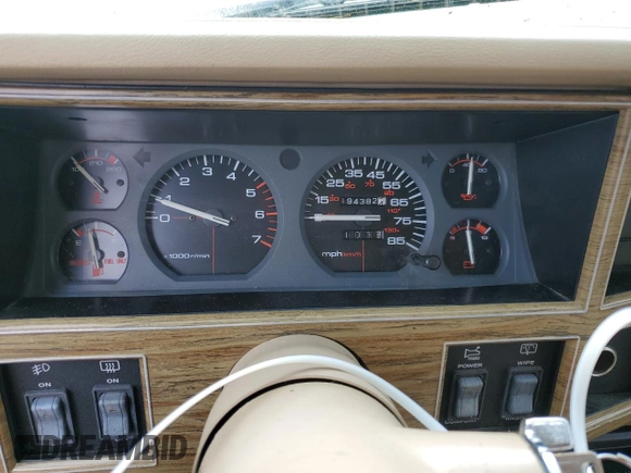 1990 Jeep Grand Wagoneer z VIN 1J4FN78L0LL282169, wystawiony jako Copart lot #59809545 z przebiegiem 194 382 mil mil oraz Czysty tytuł • Clean title. Historia ofert i sprzedaży dostępna na DreamBid. Obrazek 9.