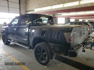 2011 Nissan Titan Pro-4X with VIN 1N6AA0EC5BN307980, listed as a Copart auction lot 42000295 with 168,335 mi miles and Salvage title. Bid and sale history available at DreamBid. Image 2.